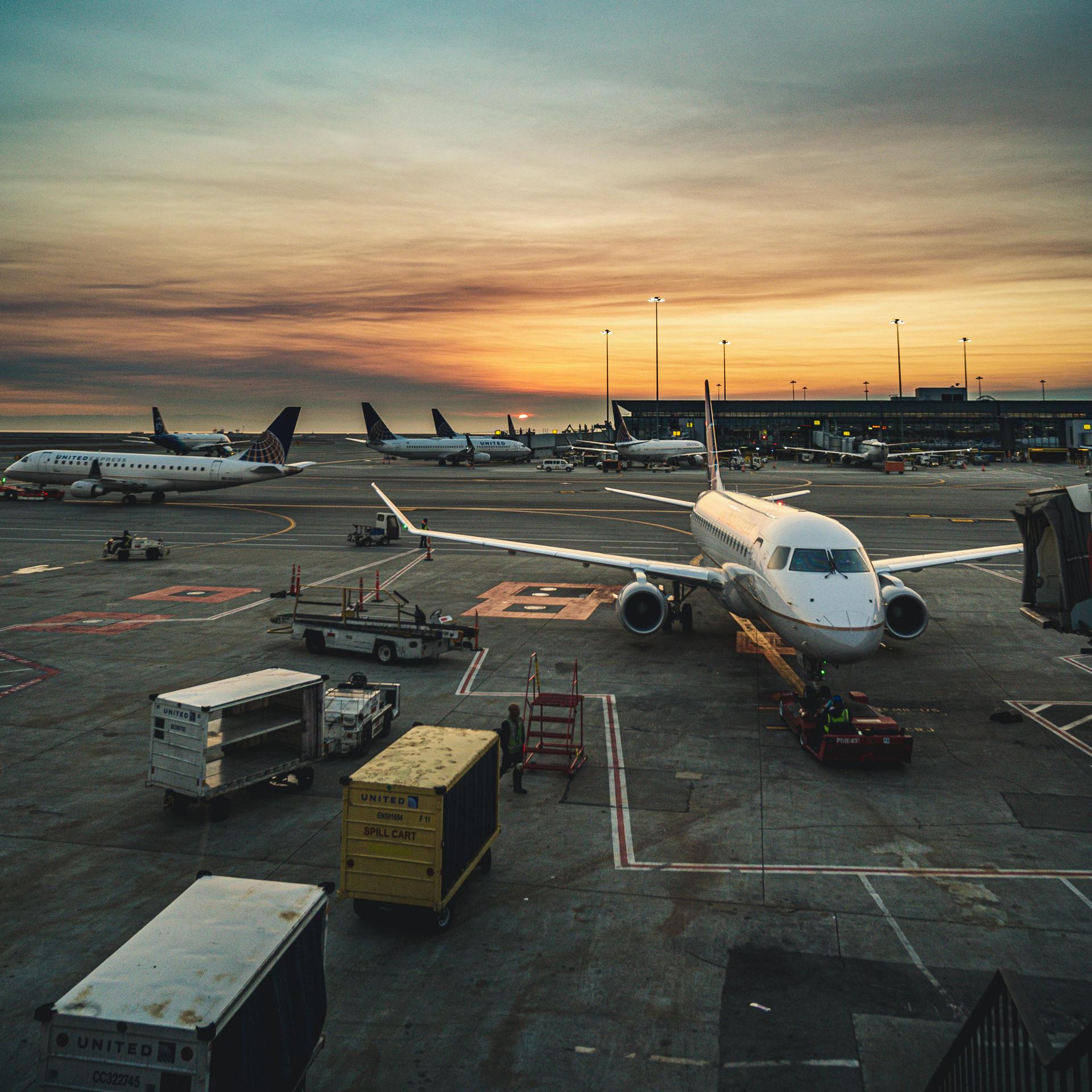 Aircraft parked at an international airport terminal, evoking the journeys Kenyan visa applicants hope to make abroad
